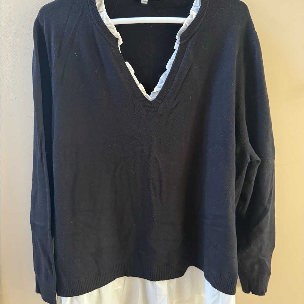 Chic Black Sweater with White Trim